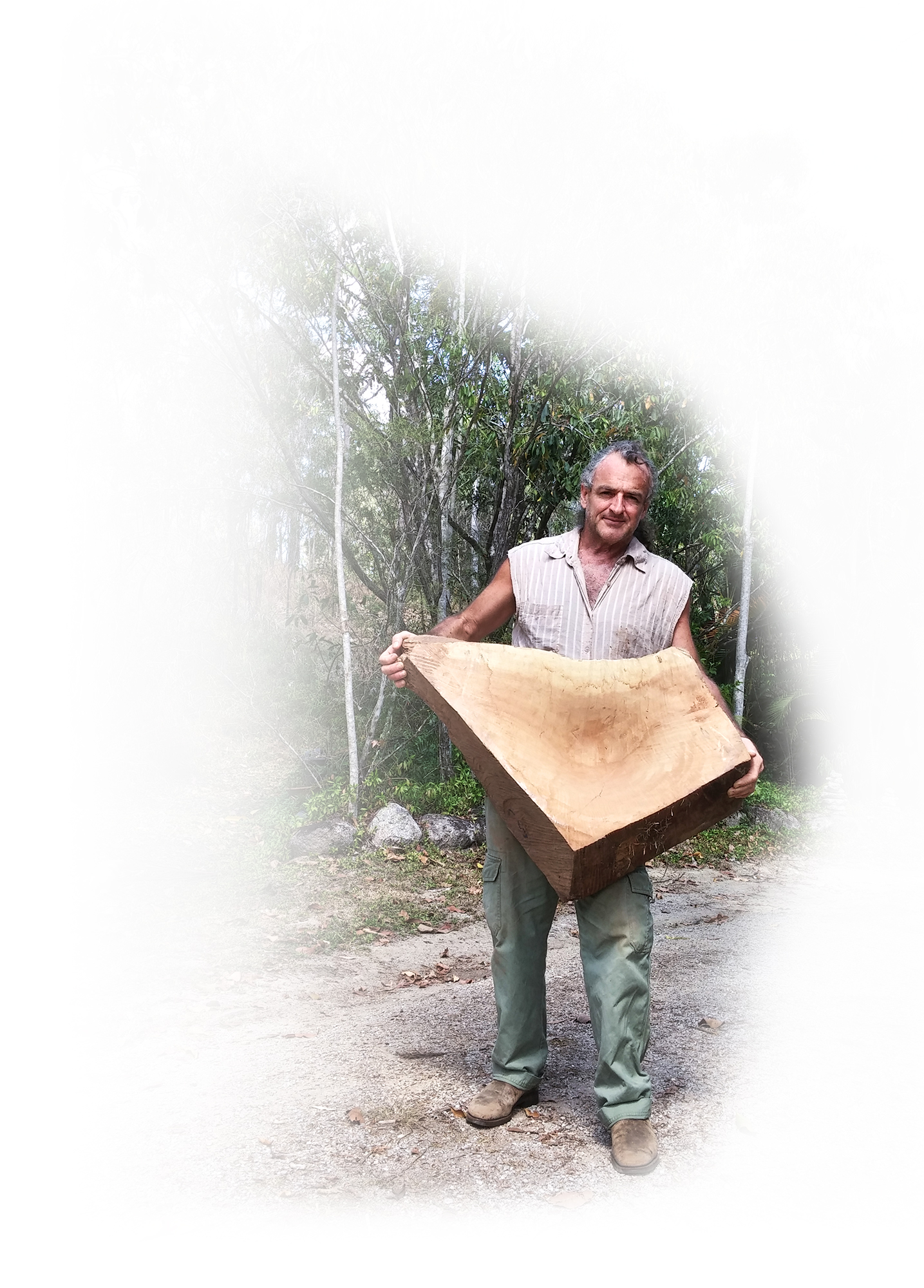 Bob Gilmour holding work in progress large bowl form in Queensland Maple.